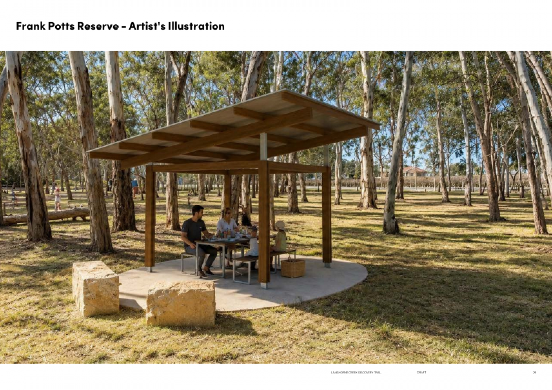 Family eating meal under picnic shelter in Frank Potts Reserve with limestone seating blocks and trees nearby.