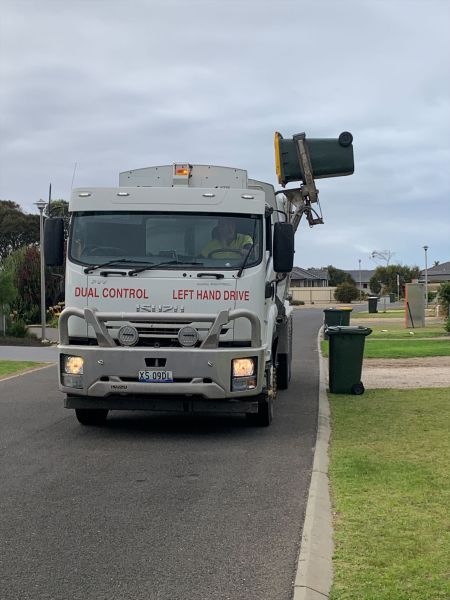 Photo of truck lifting bin
