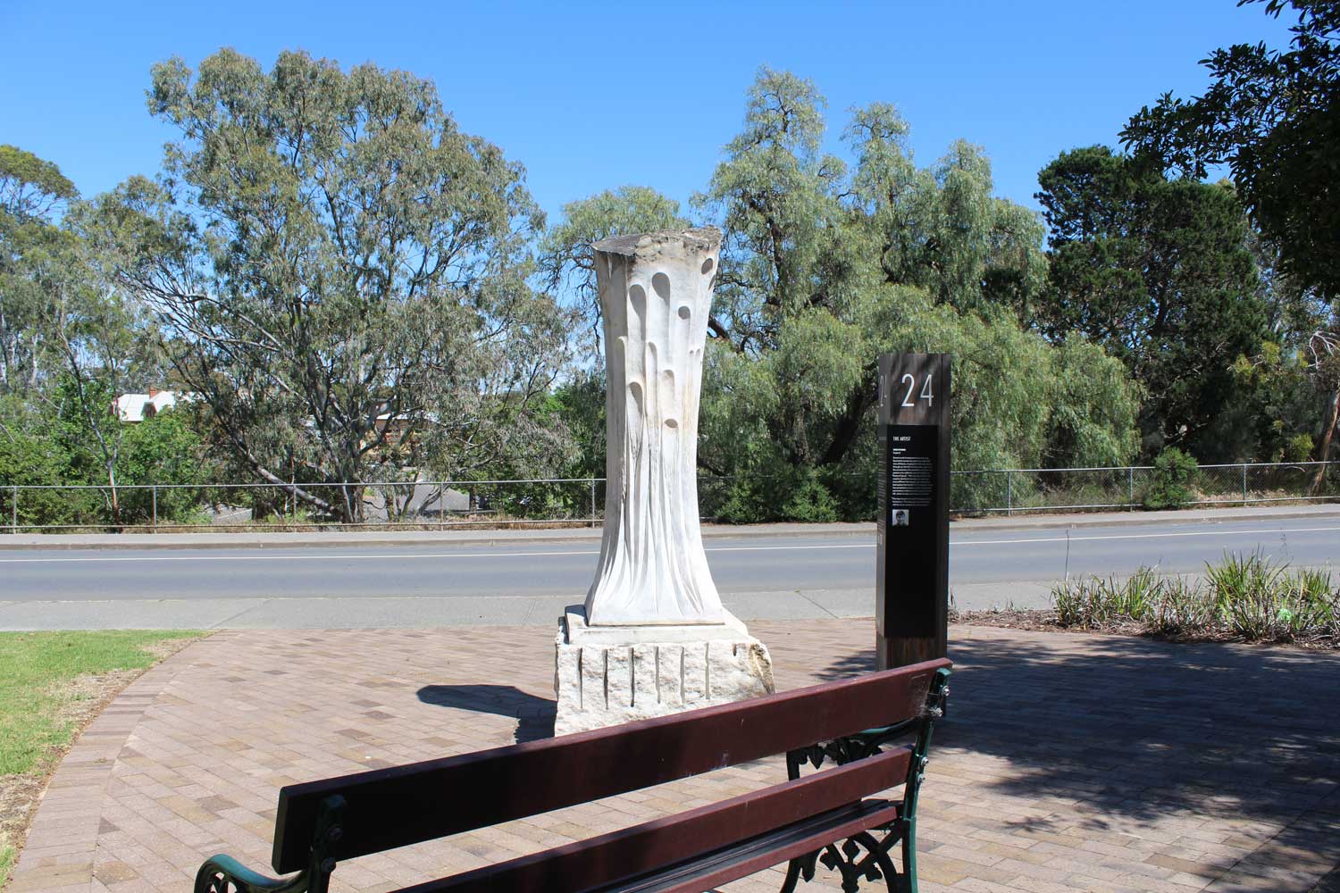 Sunter Street Pocket Park sculpture and seat looking out at the street