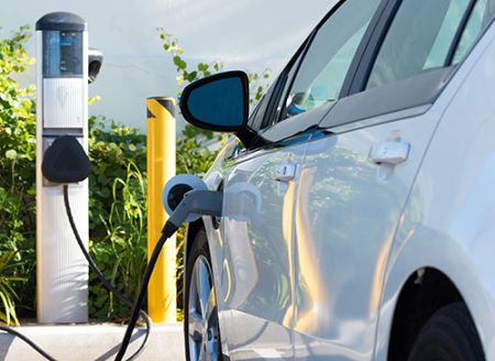 Electronic vehicle being charged